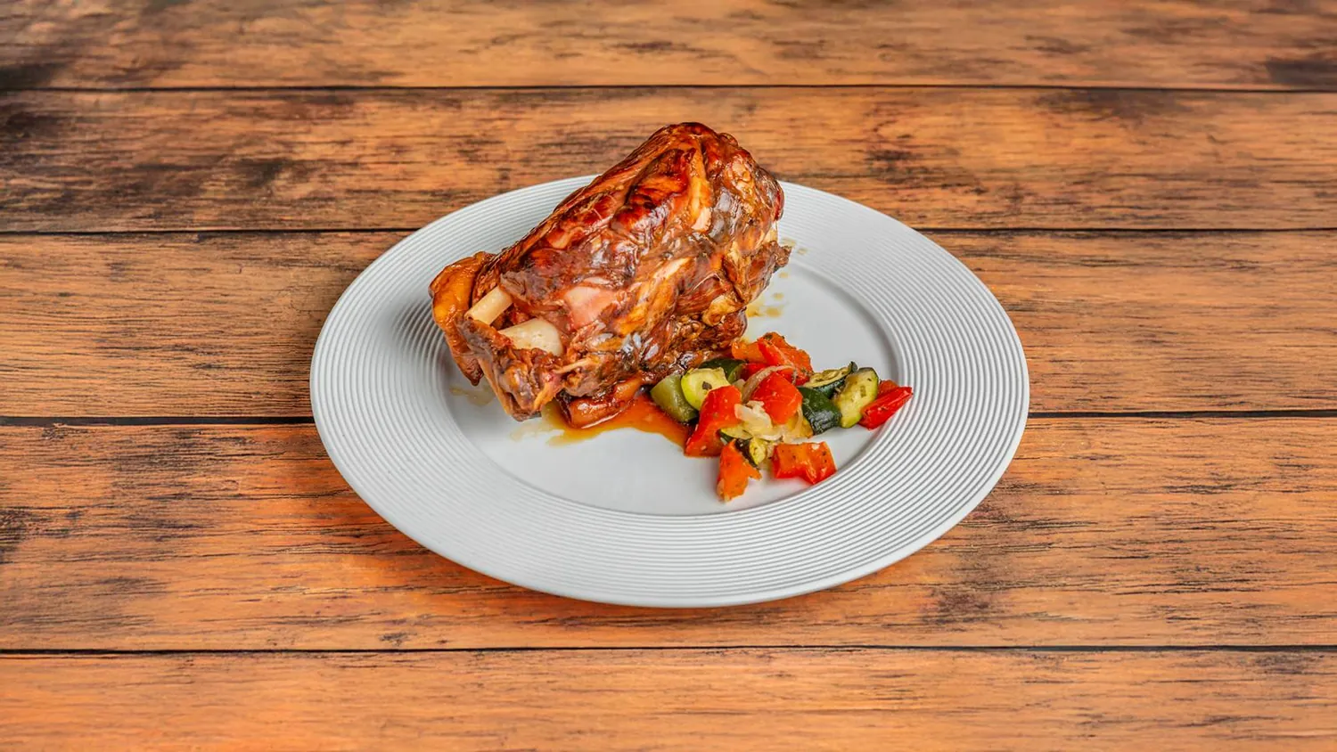 Jarret de porc et ses légumes